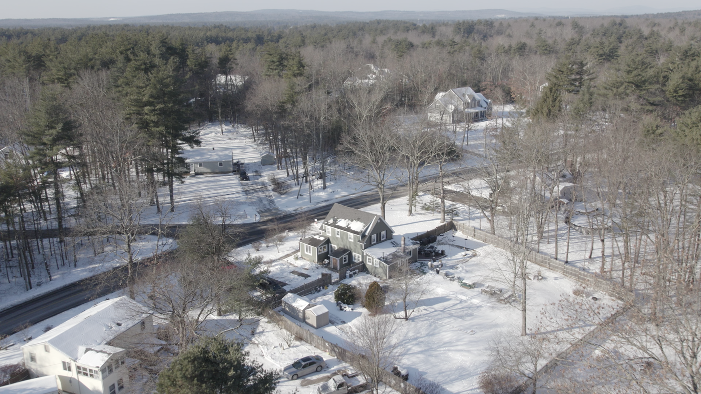 Wide aerial view over winter residences