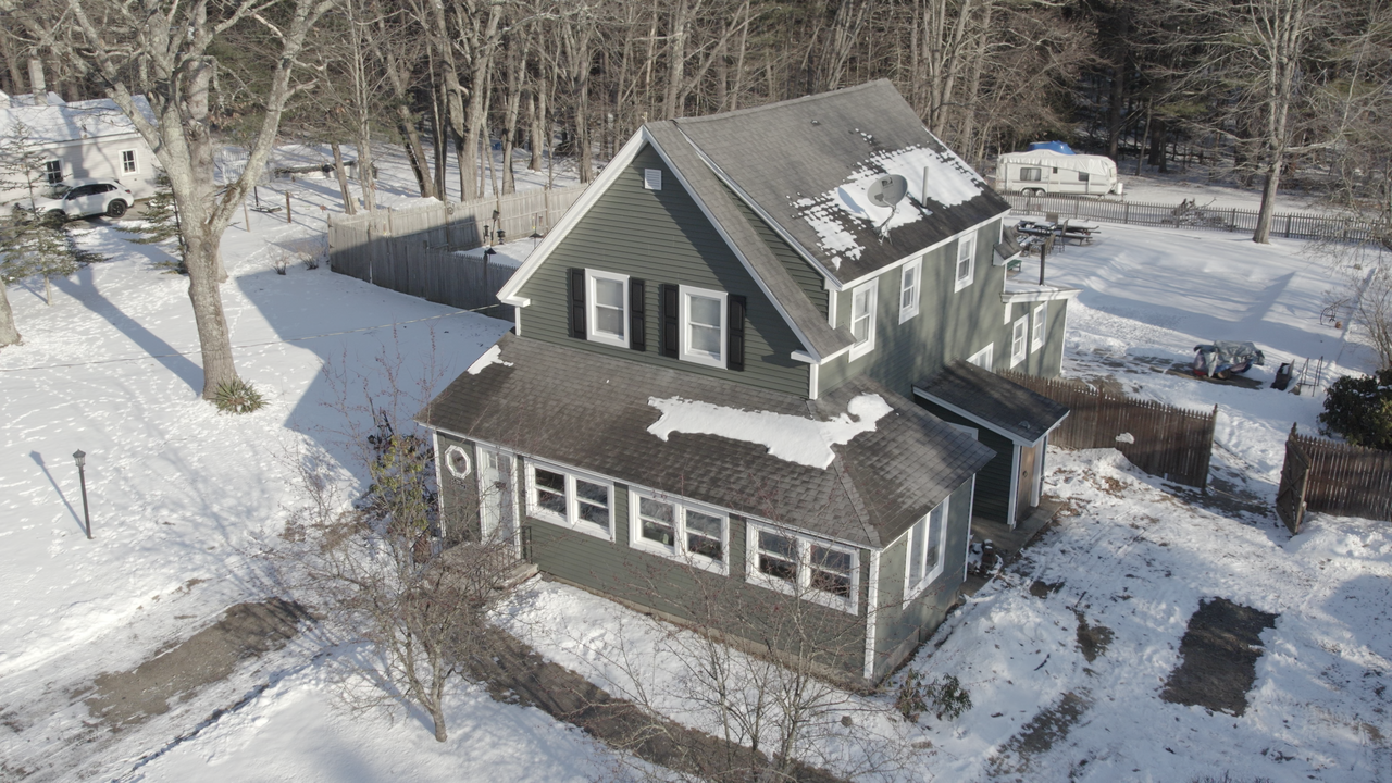 Aerial view of a snowy home