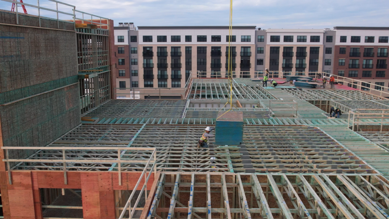 Overhead drone view of a building structure in progress