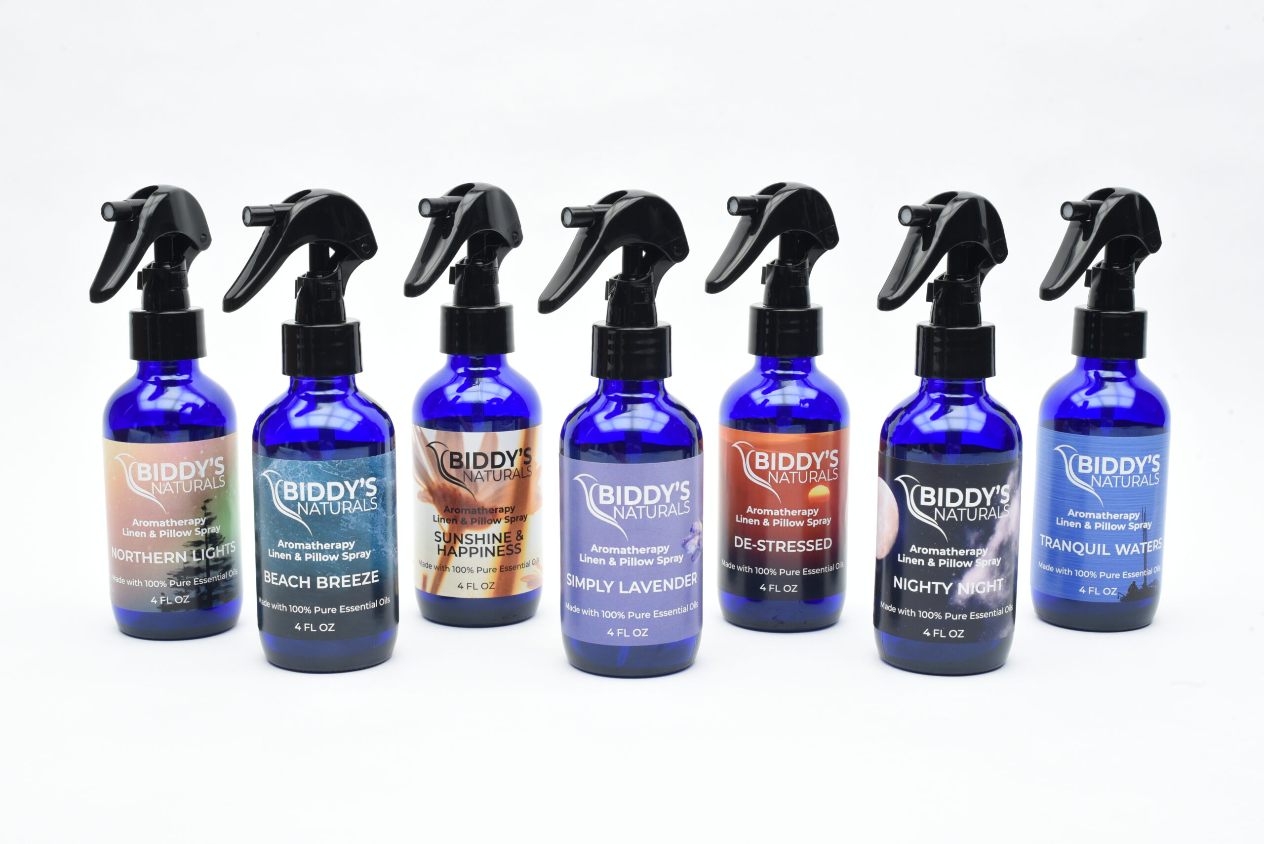 Blue spray bottles lined up with black triggers