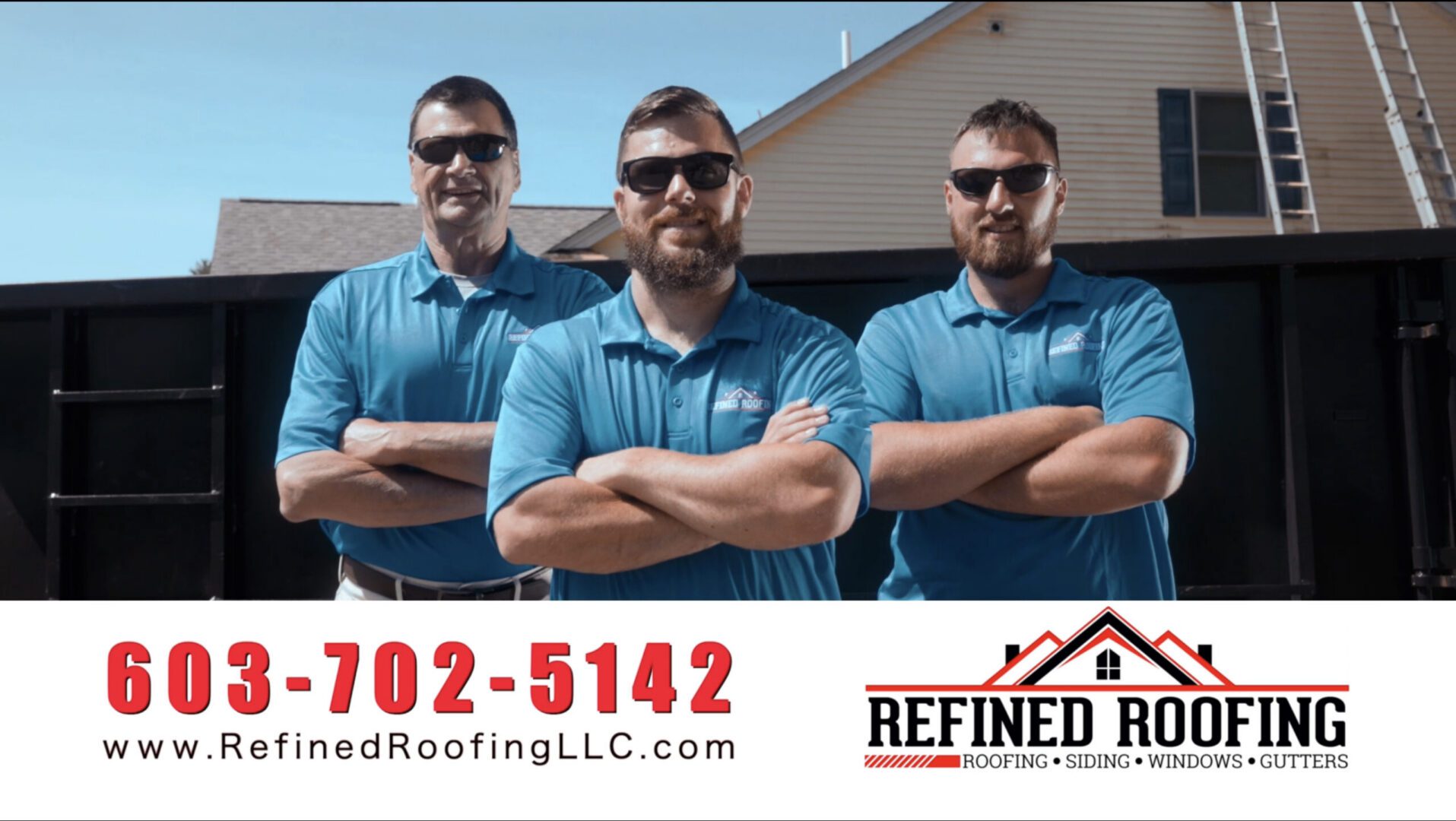 Three roofers posing in blue shirts