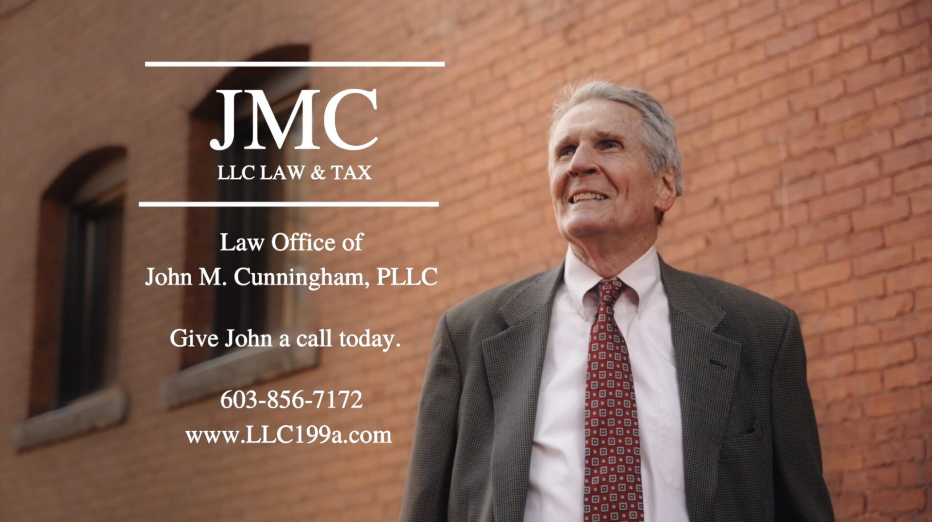 Elderly lawyer smiling by brick wall