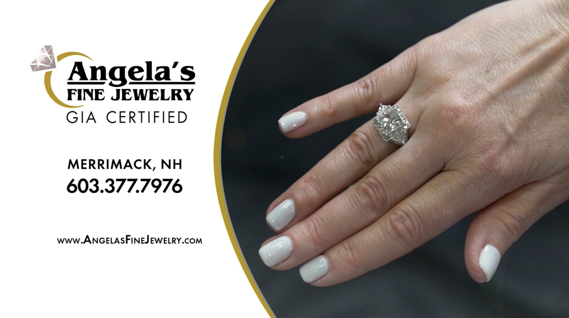Hand wearing large diamond engagement ring
